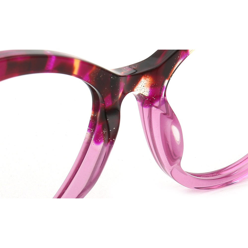 pink nose pads of eyeglasses