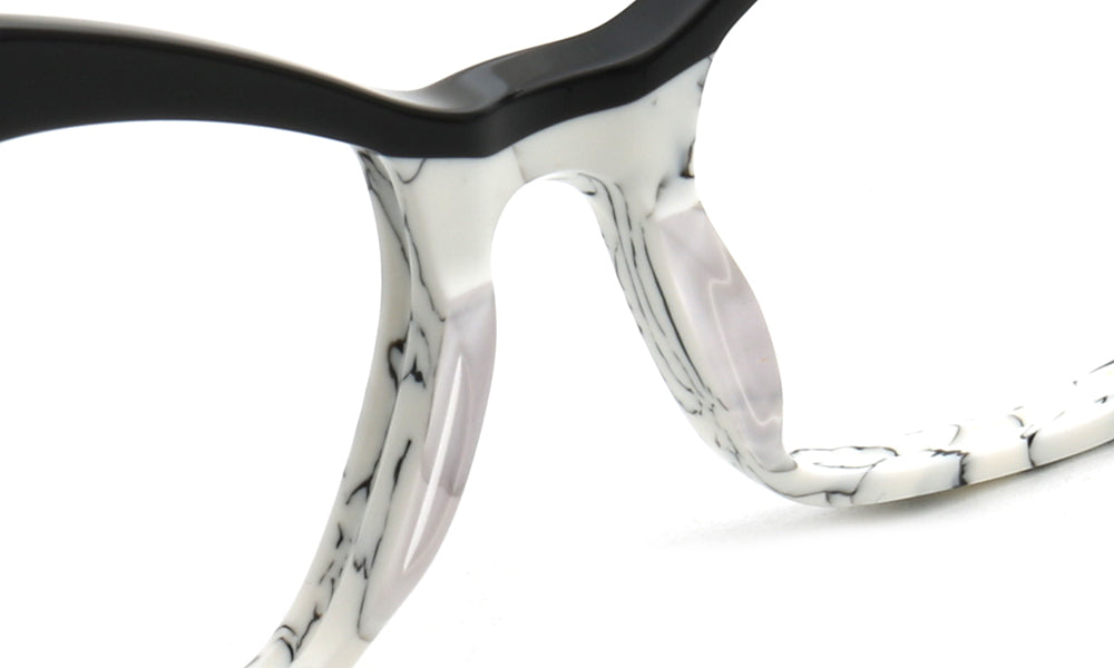 acetate nose pads of cream glasses frames