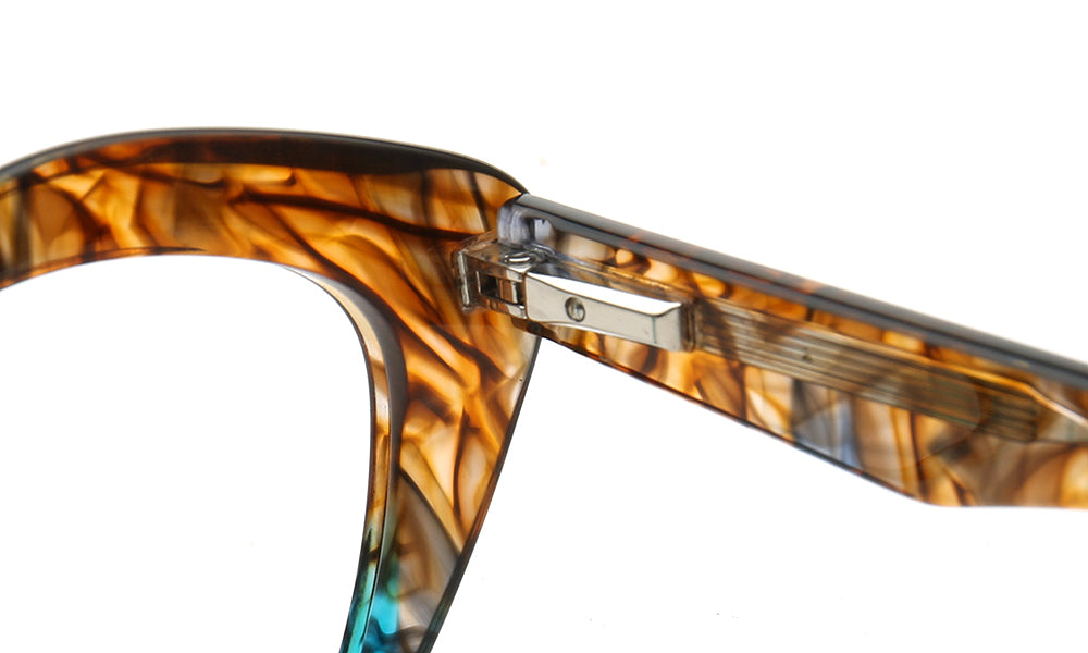 spring hinges of leopard print eyeglass frames