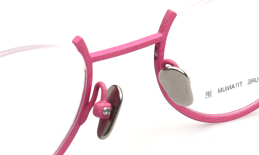 nose pads of pink cat eye titanium glasses half rim