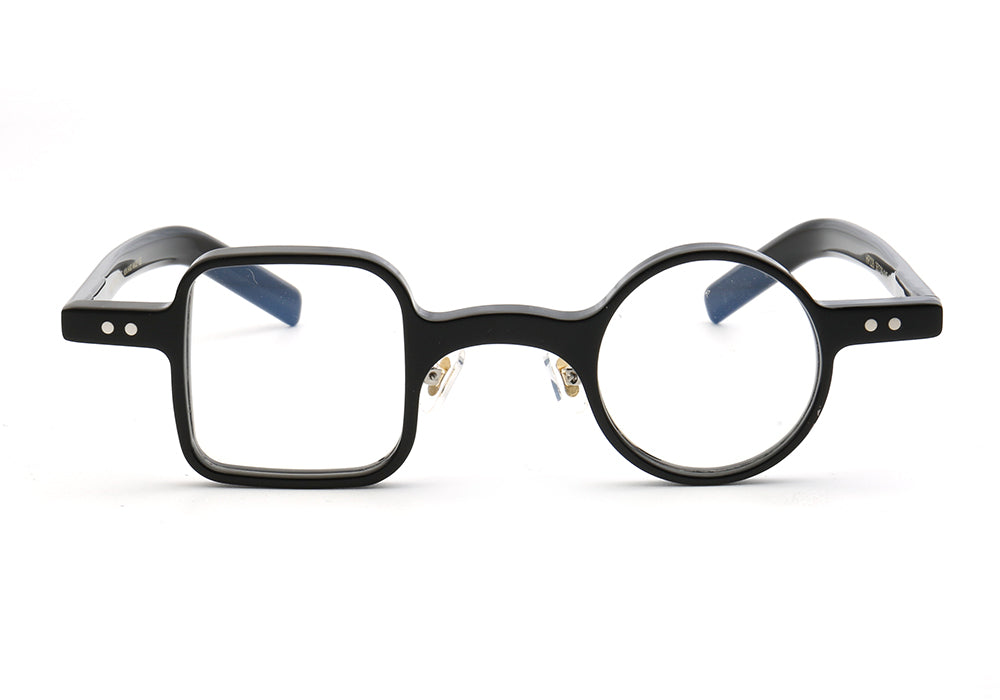 A pair of black retro mismatch glasses