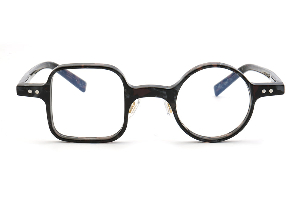 A pair of dark tortoise shell mismatch eyewear frames