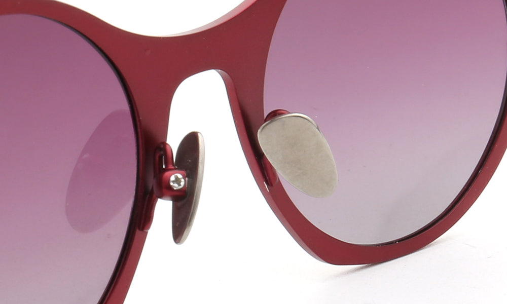 Nose pads of red titanium sunglasses