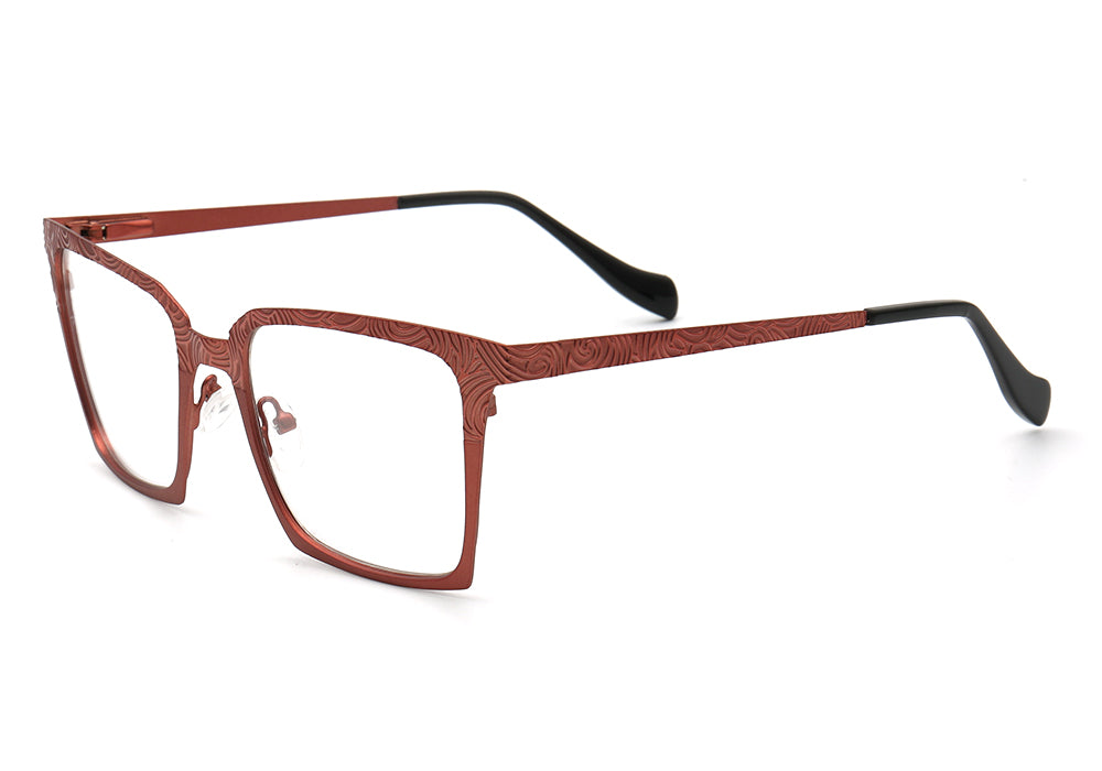 Side view of peach colored stainless steel eyeglass frames