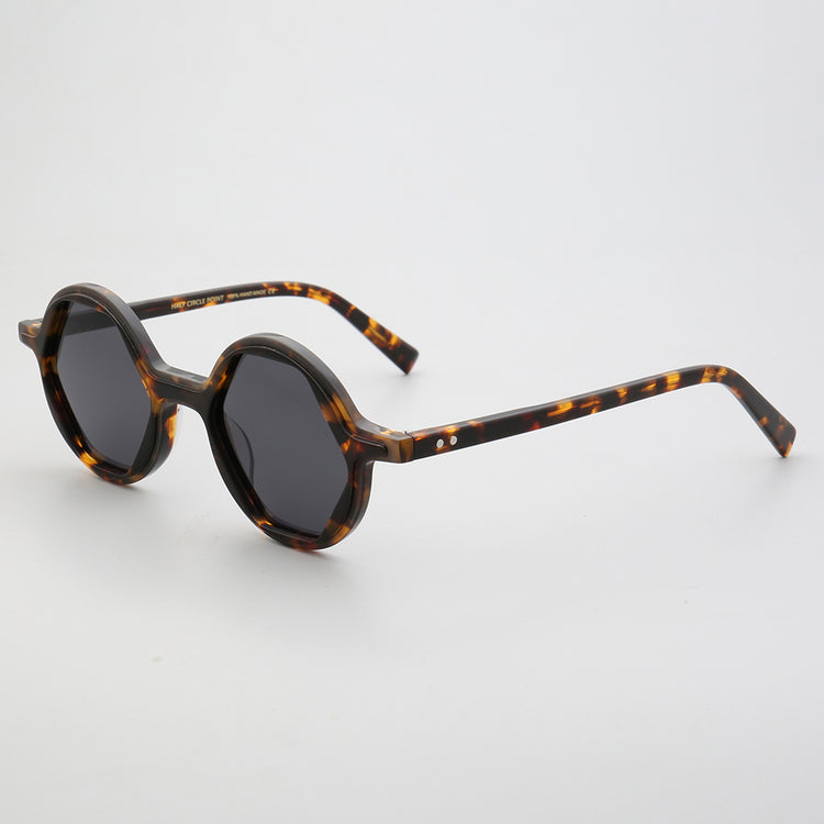 Side view of hexagon shaped tortoise sunglasses