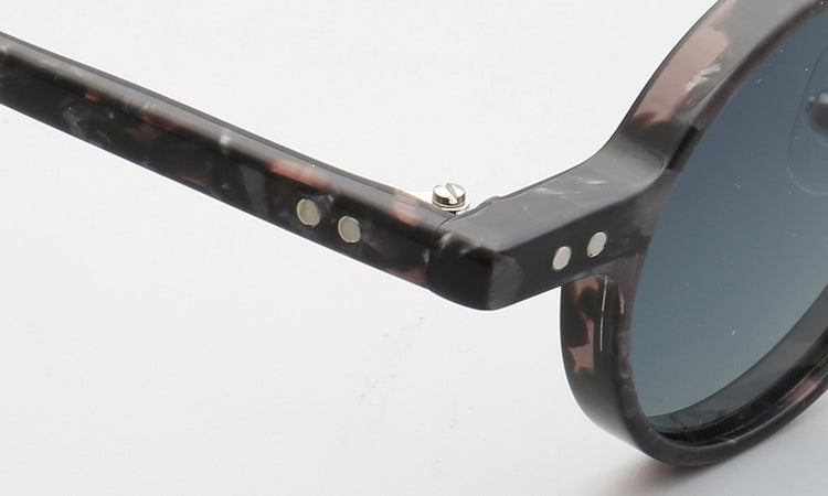 Temple of brown patterned sunglasses