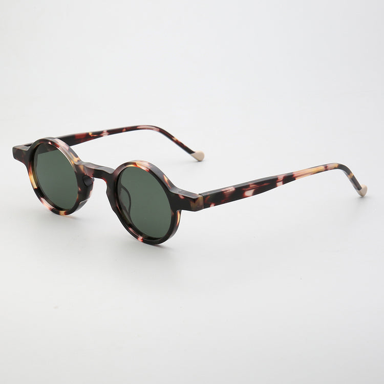 Side view of tortoise round acetate sunglasses