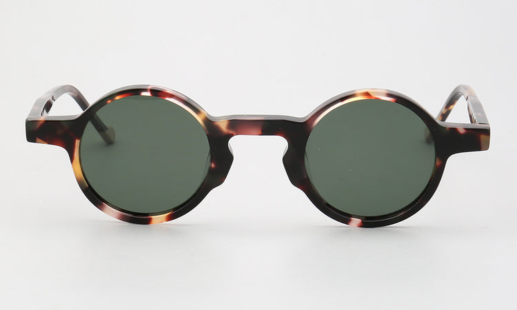 Front view of round tortoise acetate sunglasses