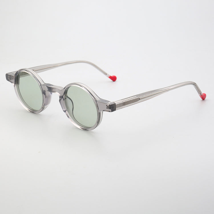 Side view of grey round acetate sunglasses