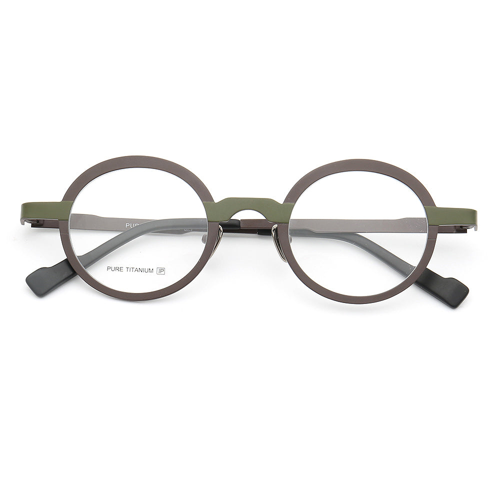A pair of green and black round titanium eyeglasses