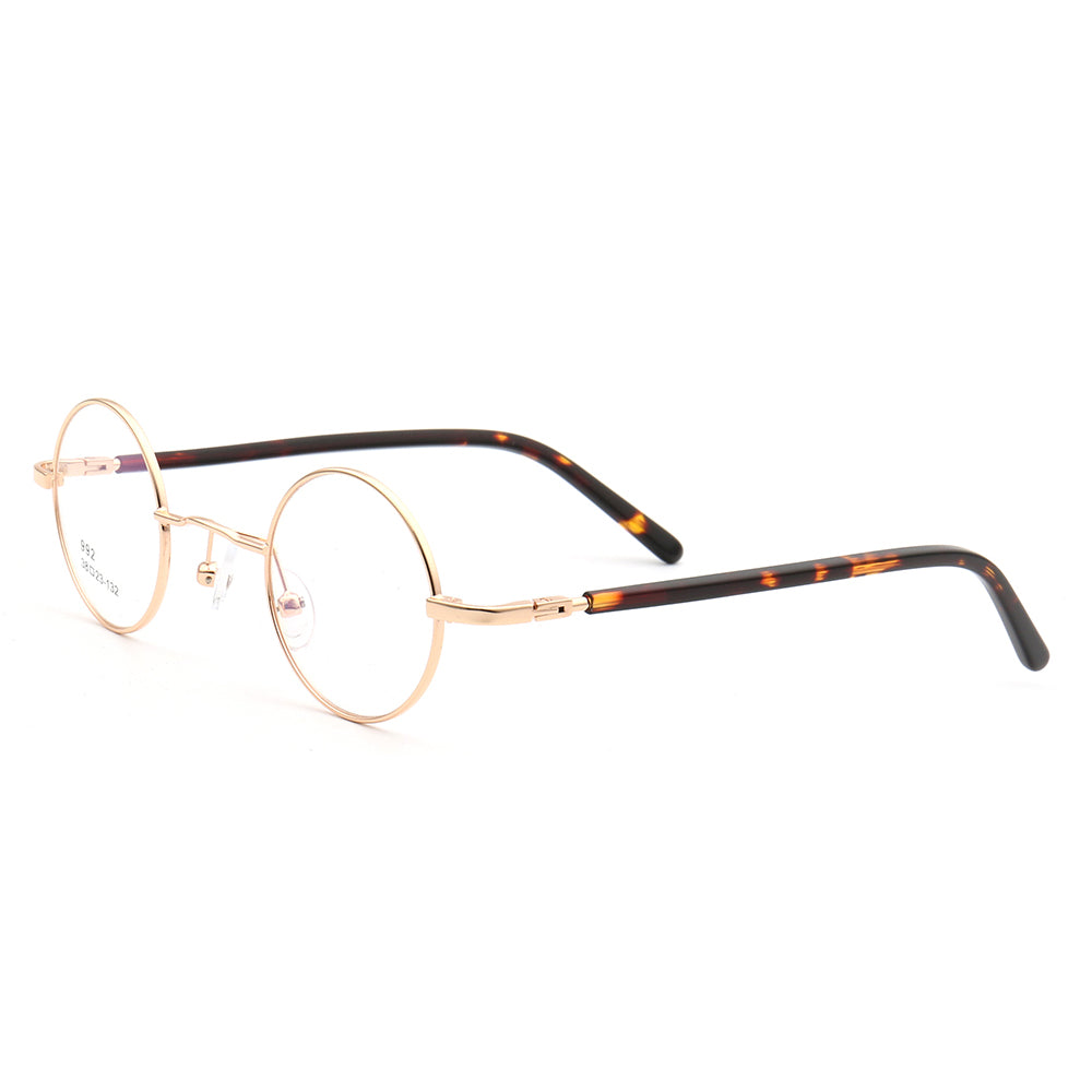 Side view of gold and tortoise round eyeglasses