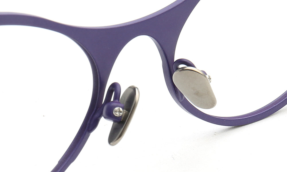 Nose pads of purple titanium glasses frames