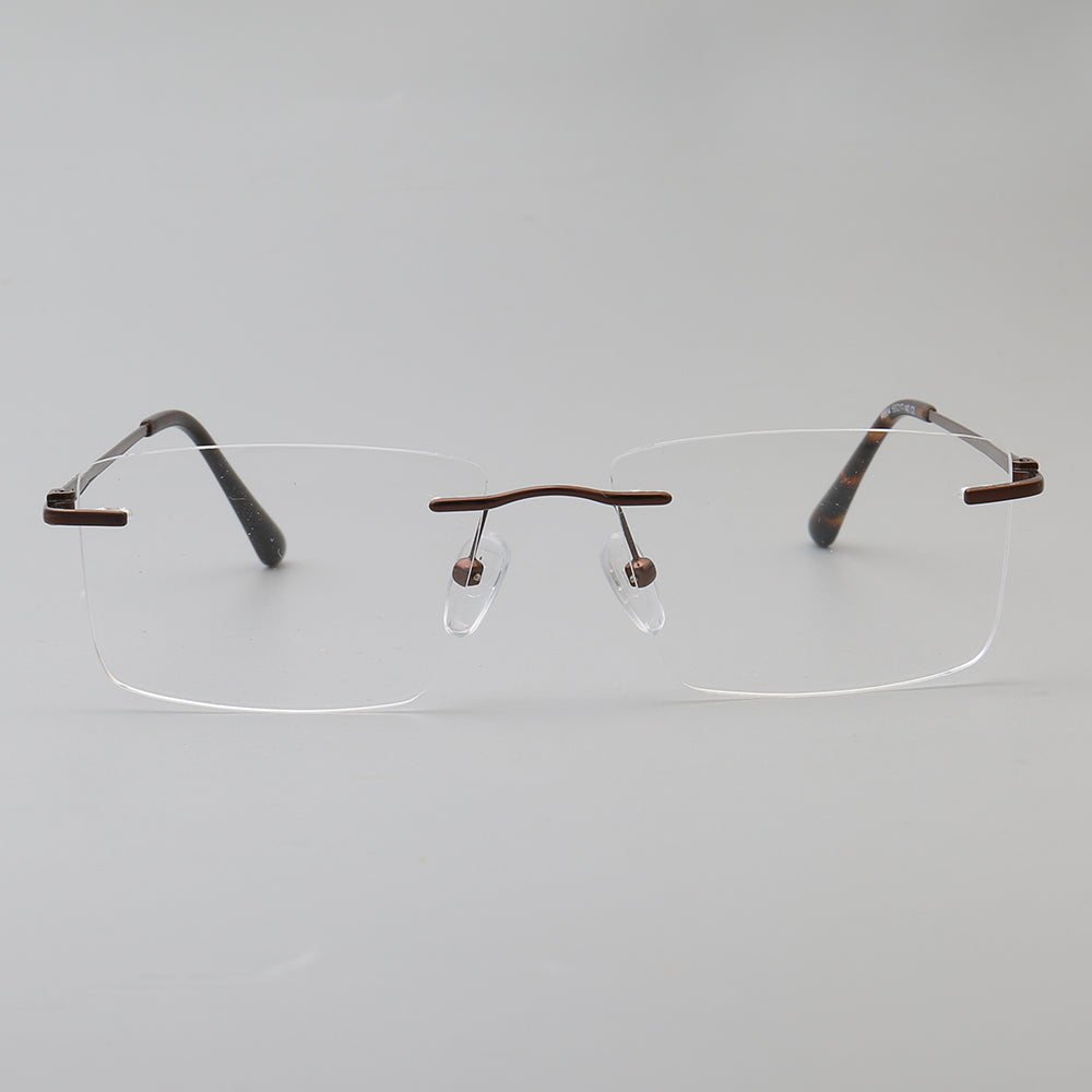 A pair of bronze rectangular rimless metal eyeglasses