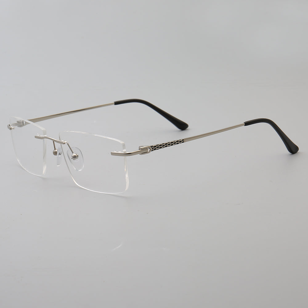 Side view of silver rectangular rimless eyeglass frames