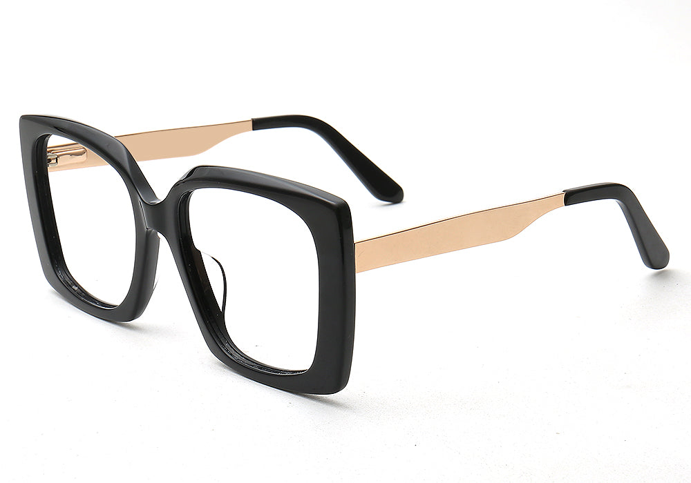 Side view of black and gold oversized butterfly eyewear frames