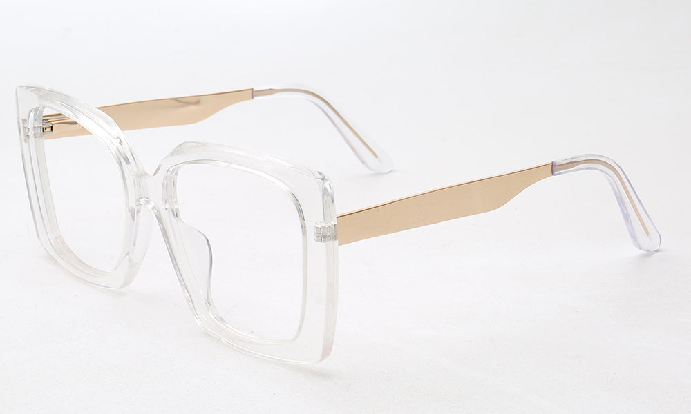 Side view of clear and gold oversized butterfly eyewear frames