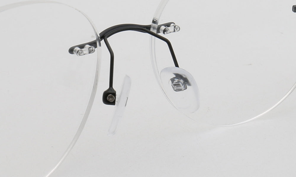 Nose pads of round rimless eyeglass frames