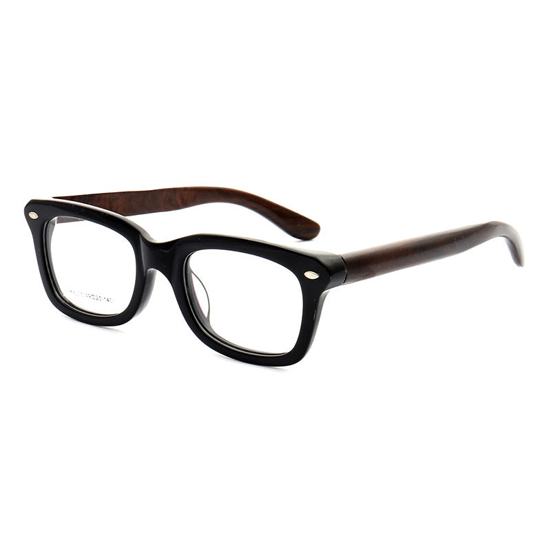 Side view of a pair of black full rim wooden eyeglasses