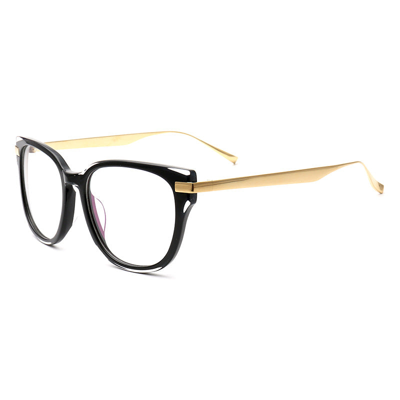 Side view of black and gold titanium eyeglasses for women