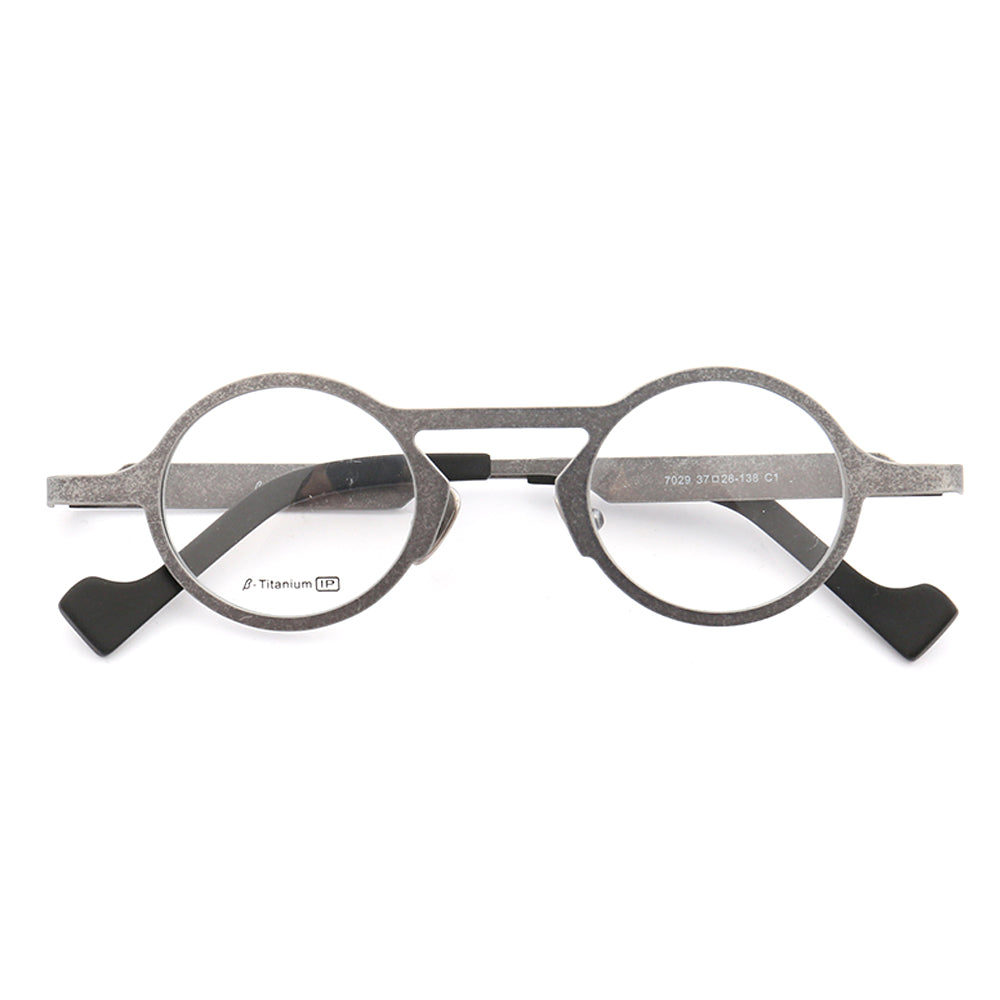 A pair of round grey titanium eyeglasses