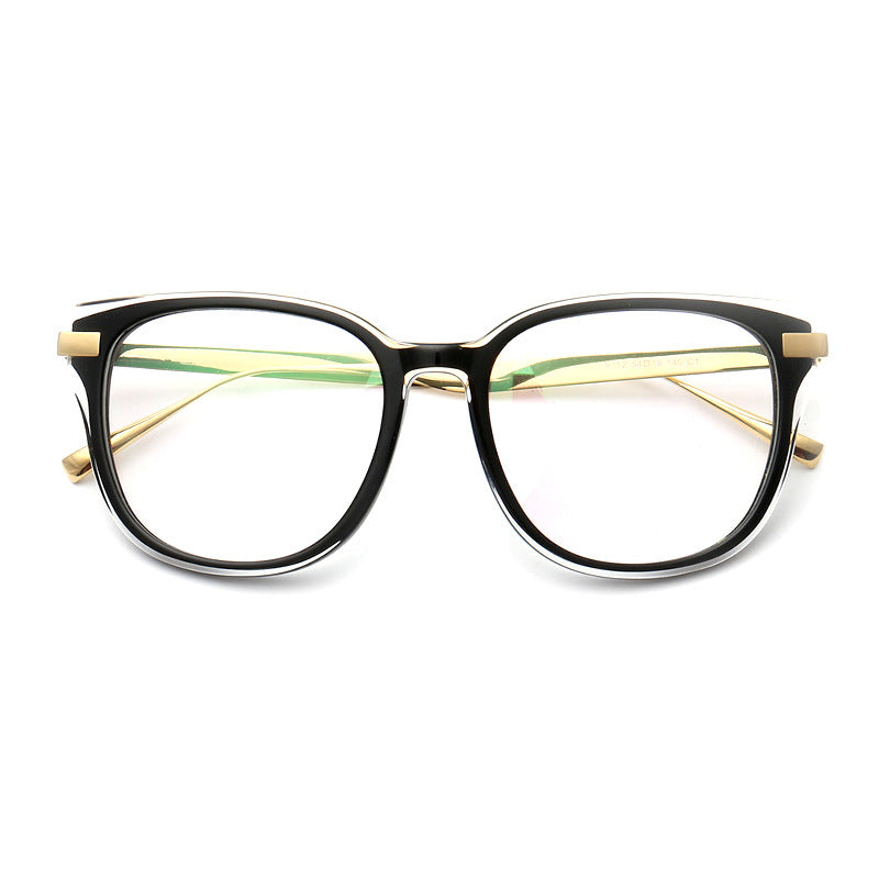 A pair of black and gold titanium eyeglasses for women