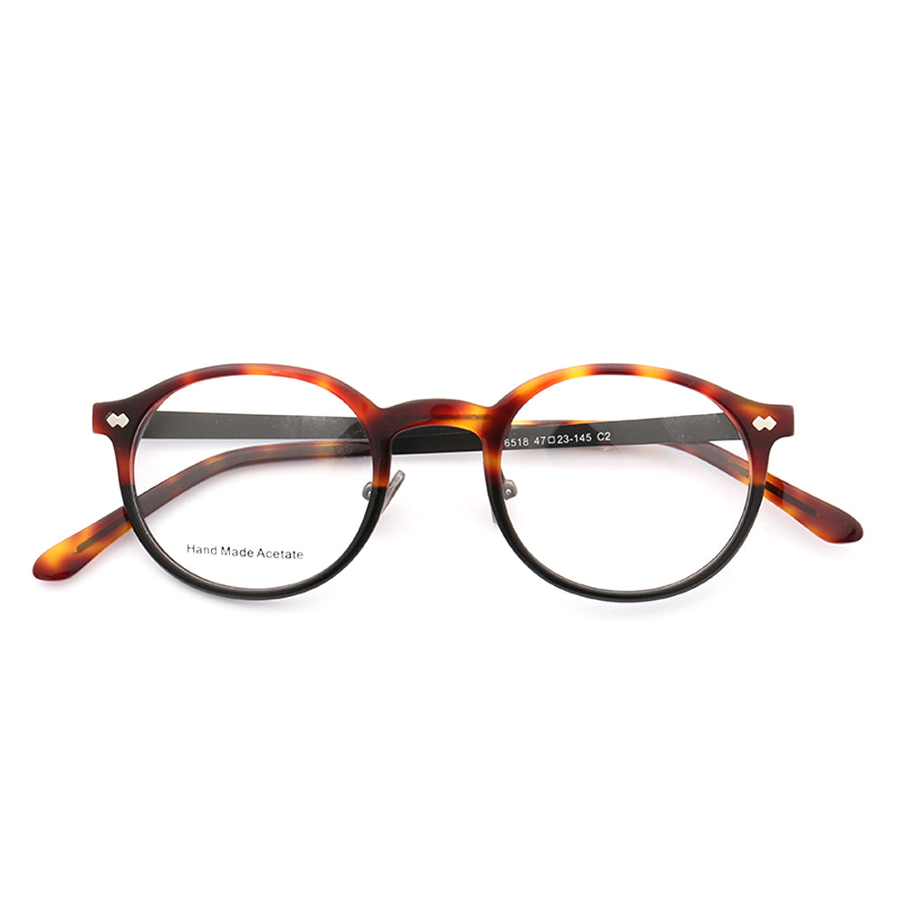 A pair of tortoise composite full rim eyeglasses