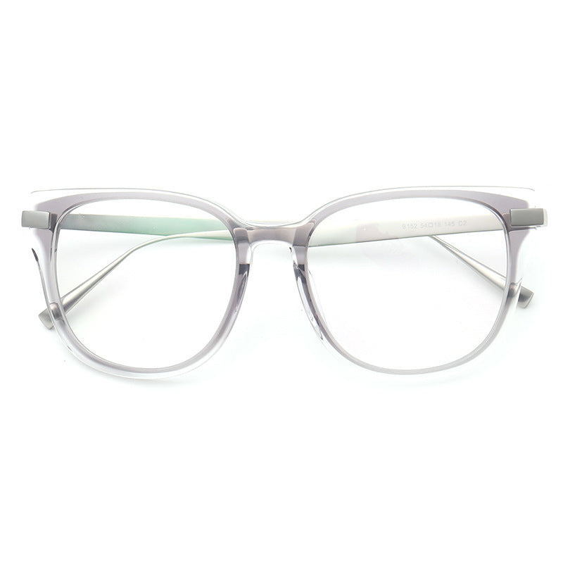A pair of grey full rim titanium eyeglasses for women
