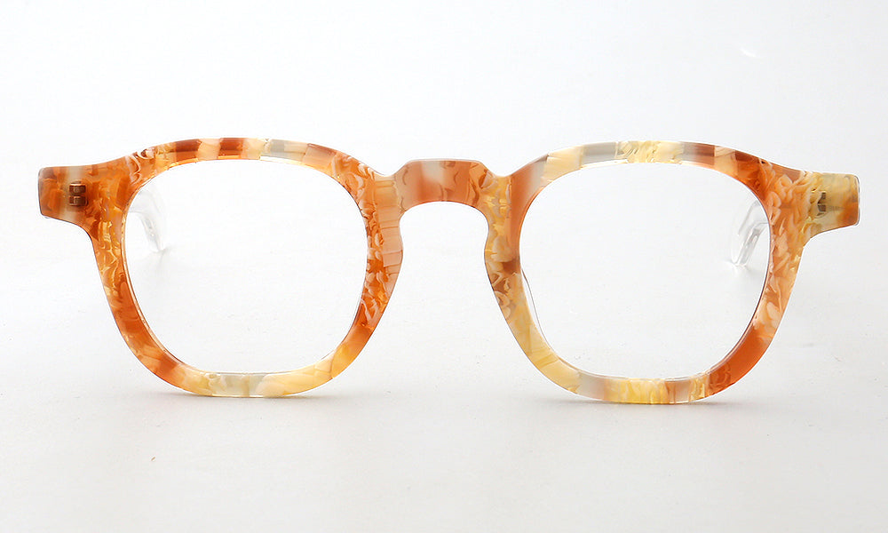 Front view of patterned tortoise orange eyeglasses