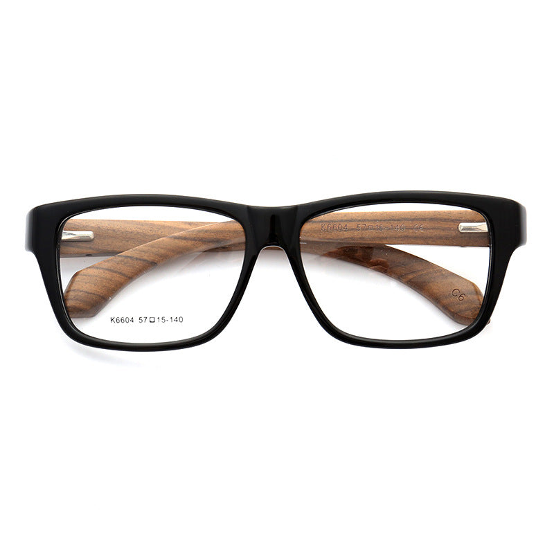 A pair of black and brown square full rim wood eyeglasses