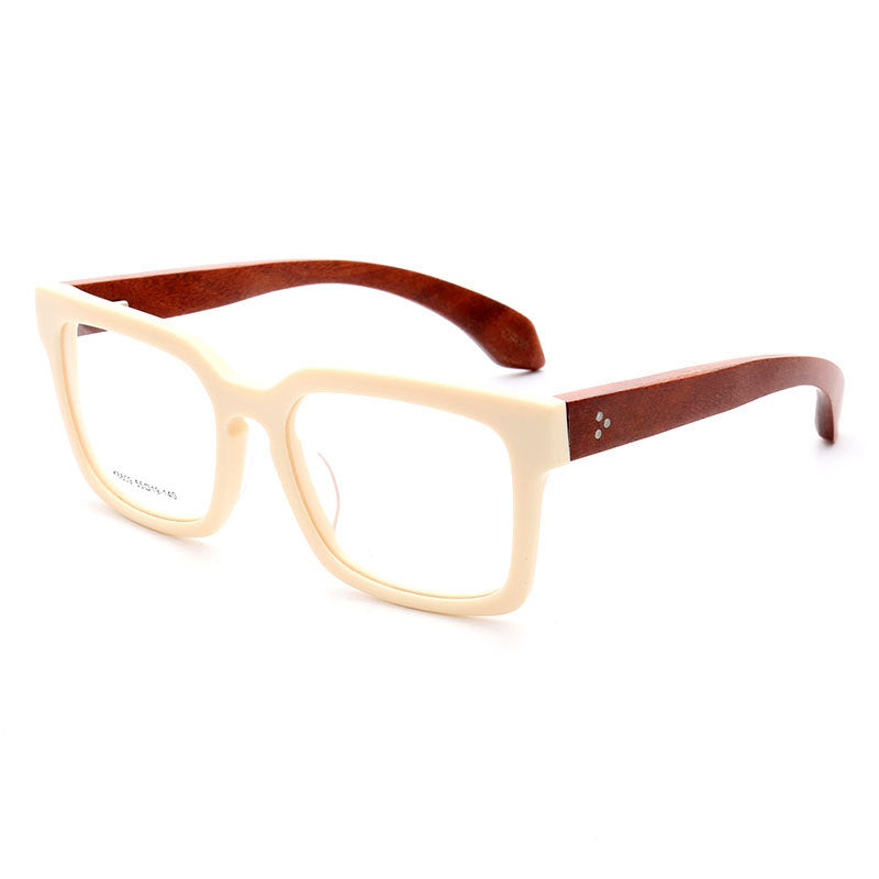 Side view of cream colored wooden eyeglass frames