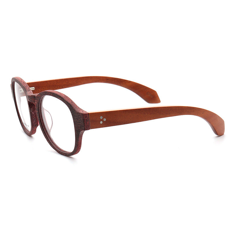 A pair of round retro wooden eyeglass frames