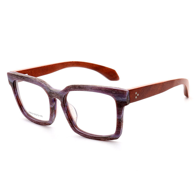 A pair of two toned oversized wooden eyeglasses