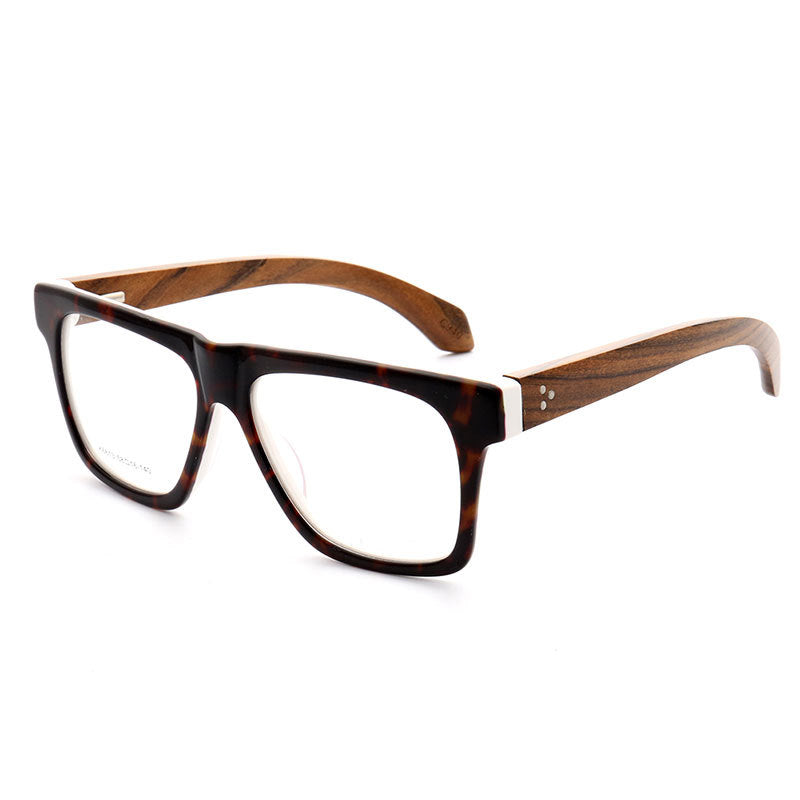 Side view of tortoise shell eyeglasses with wood temples