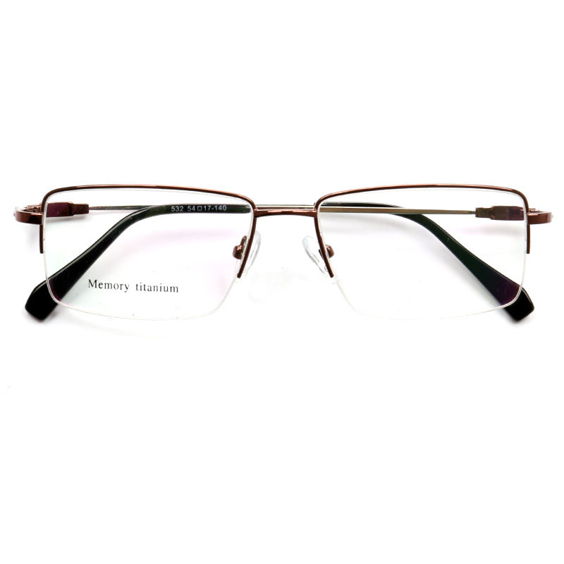 A pair of bronze rectangular half rim eyeglass frames