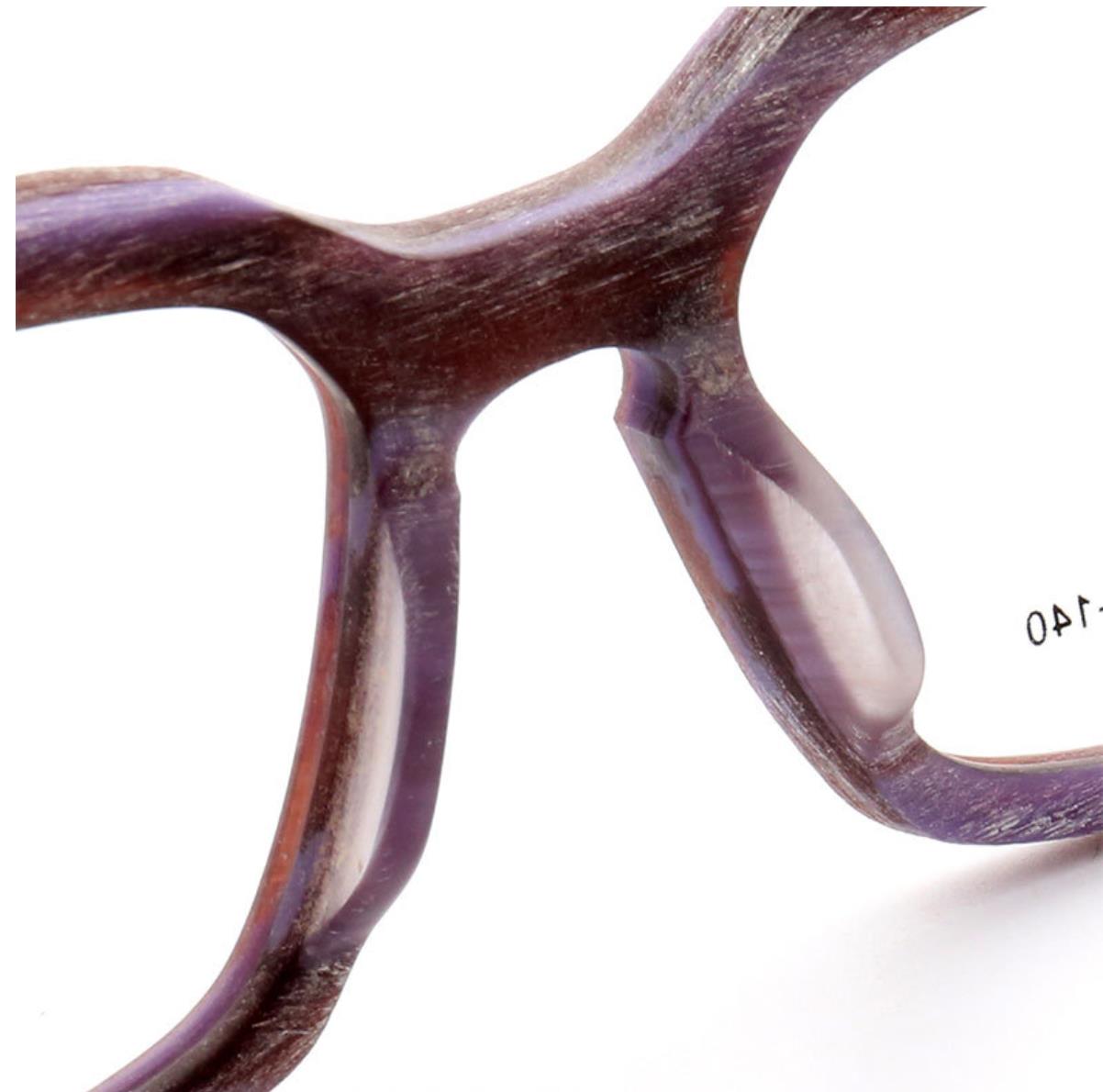 Nose pads of two toned wooden eyeglass frames