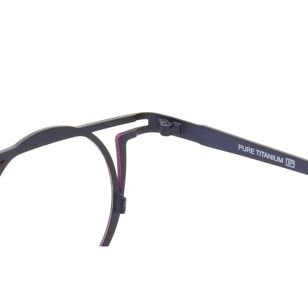 Inner hinge of blue flat top eyeglass frames