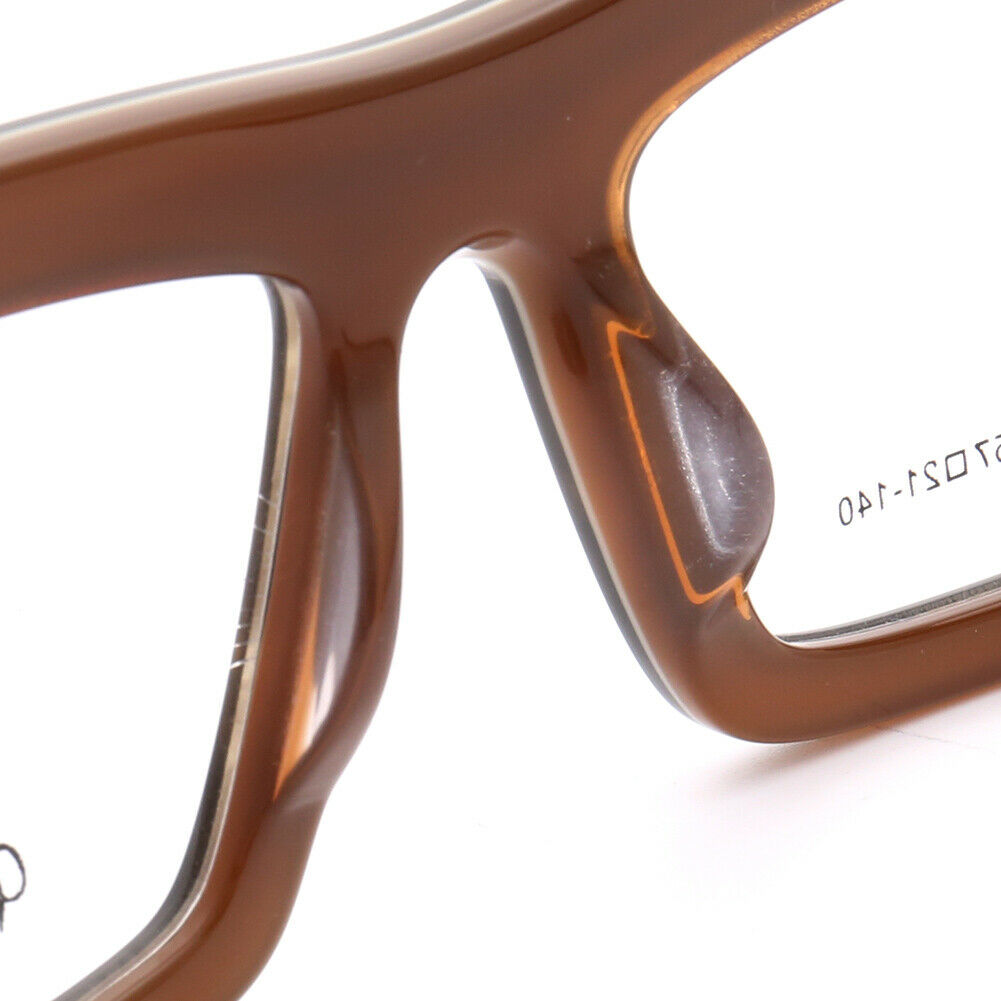 Bridge of brown wooden eyeglass frames