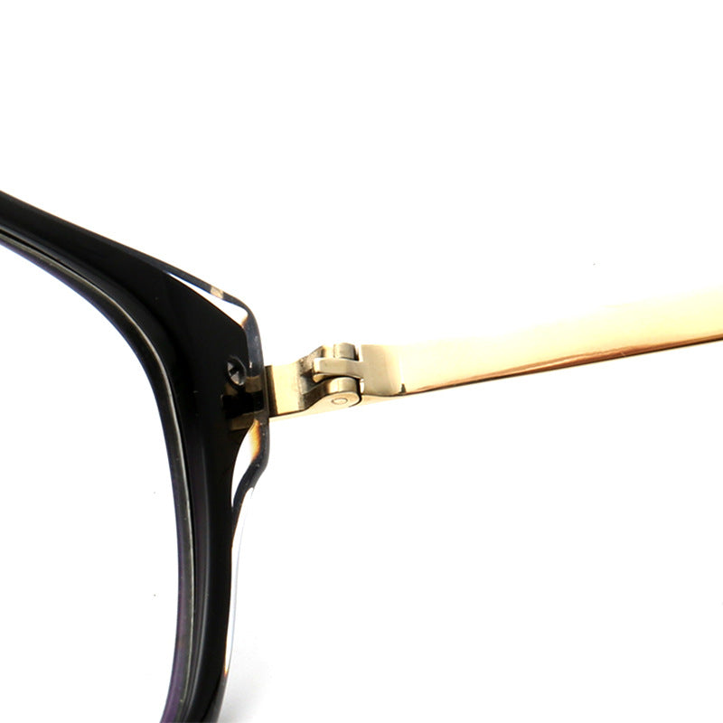 Inner hinge of black and gold titanium eyeglasses