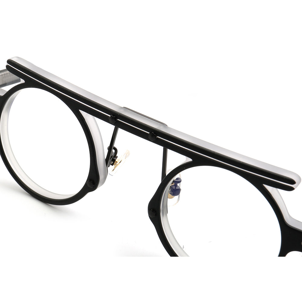 Bridge of black and white acetate eyeglass frames