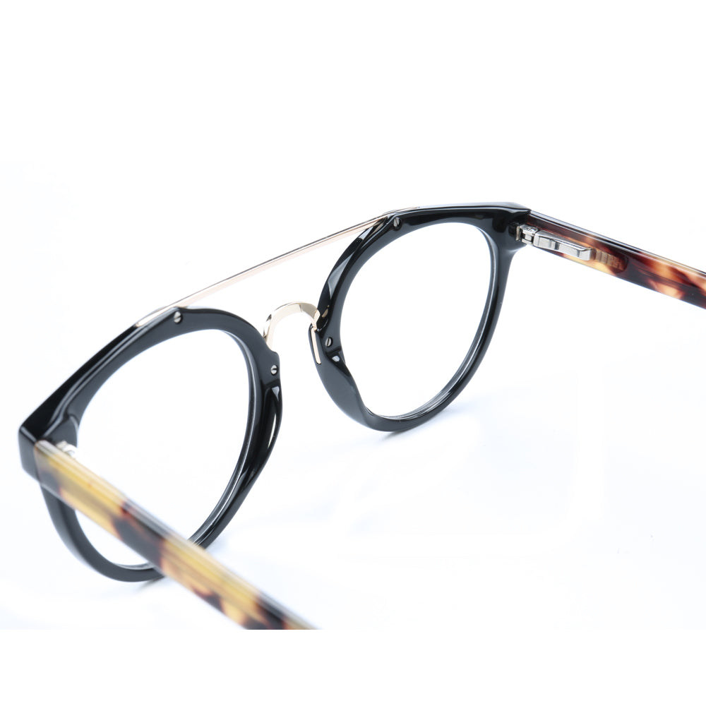 Aerial view of black tortoise shell round eyeglass frames