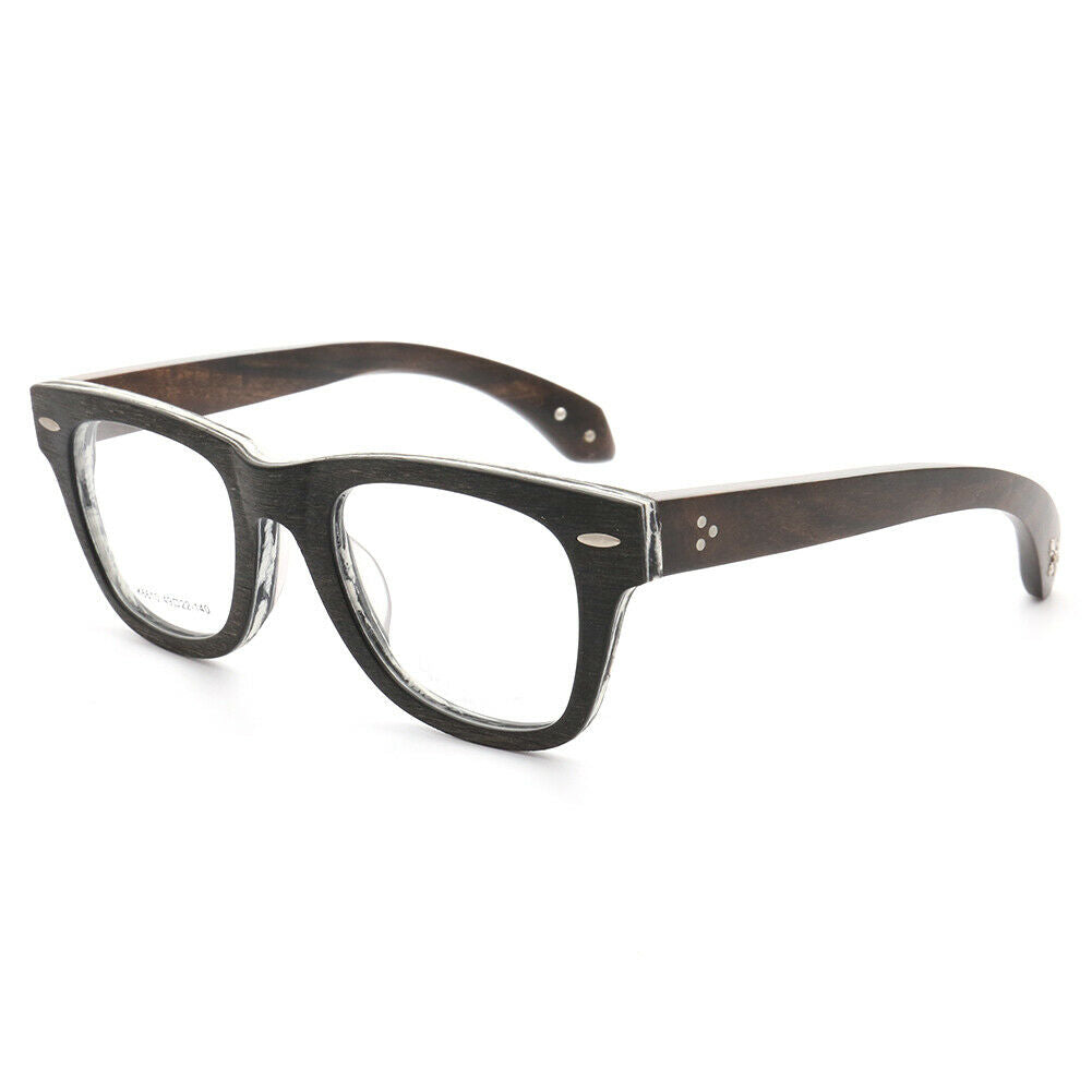 A pair of black and white wooden eyeglasses