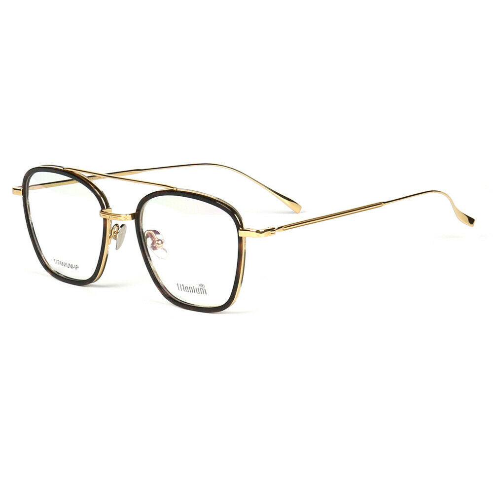 A pair of gold and black titanium eyeglasses