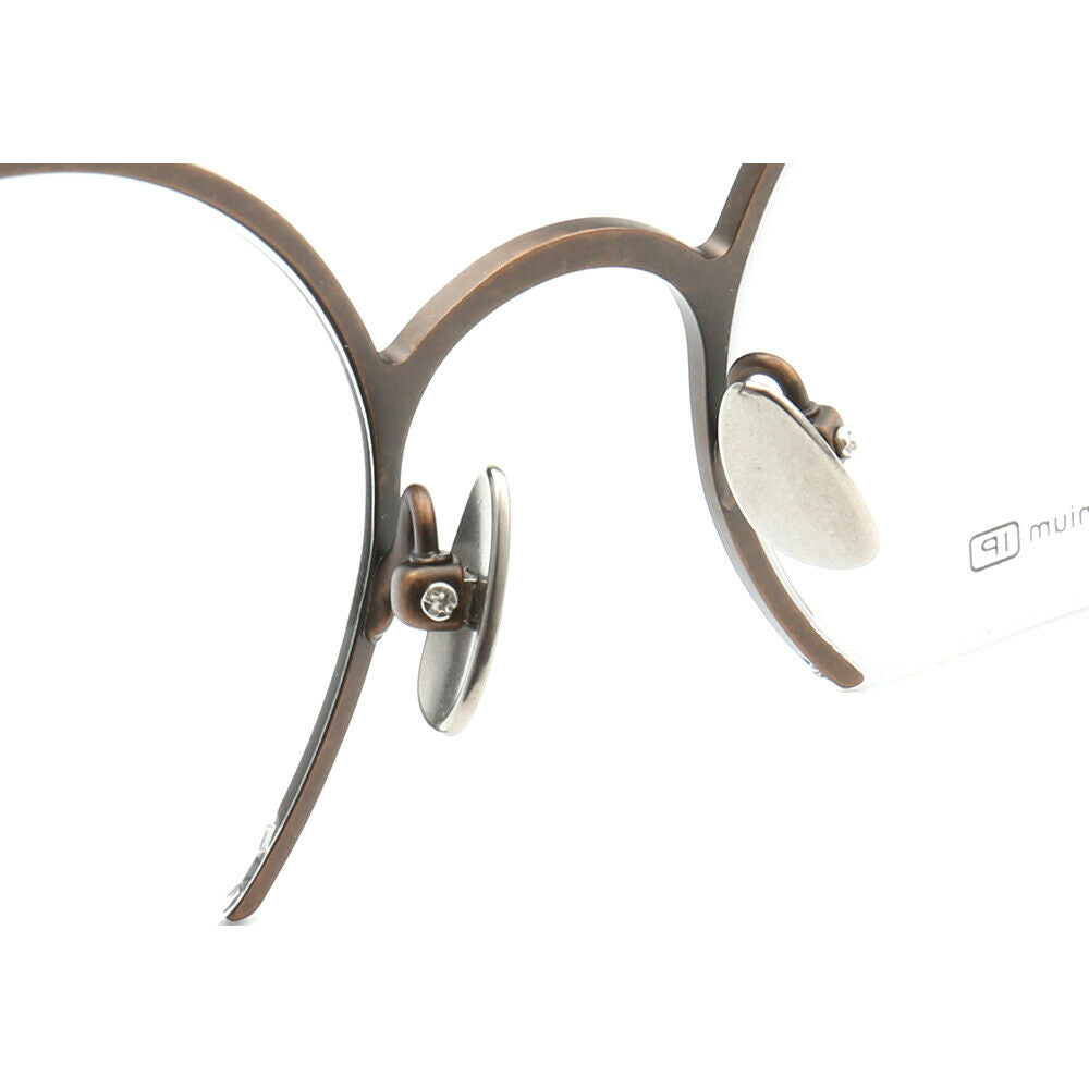 Nose pads of round half rim eyeglasses