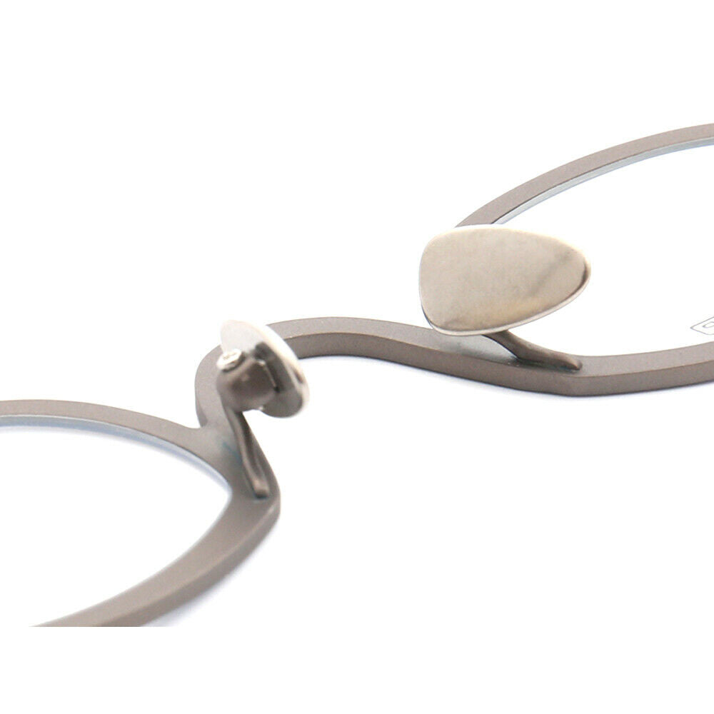 Nose pads of grey titanium eyeglasses