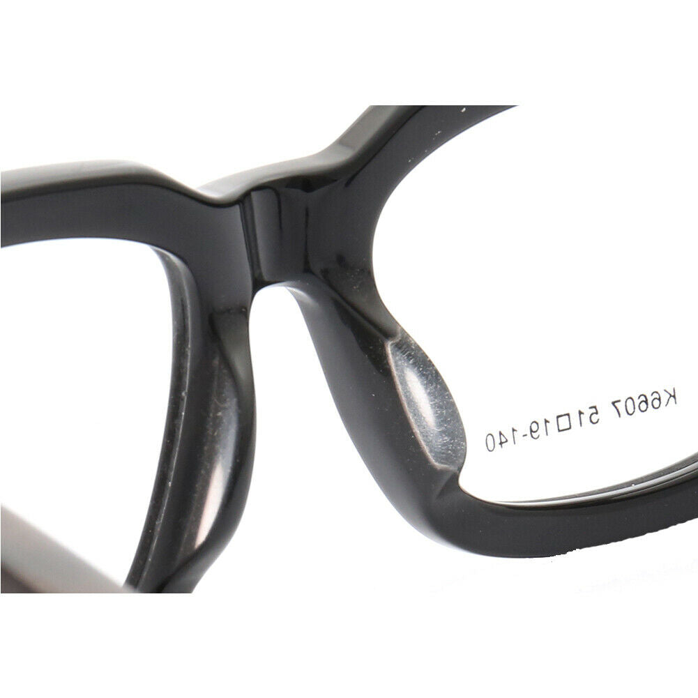 Interior of black oversized wooden eyeglass frames