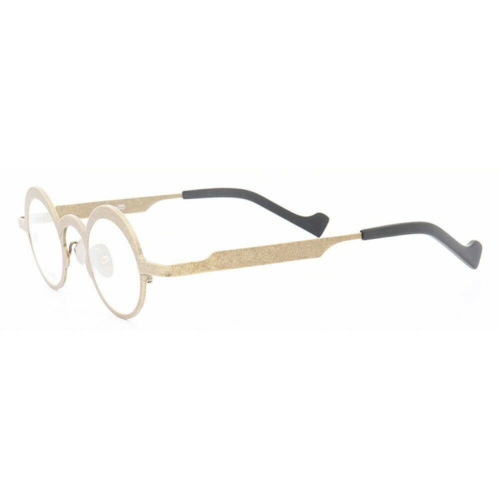 Side view of gold round titanium eyeglasses