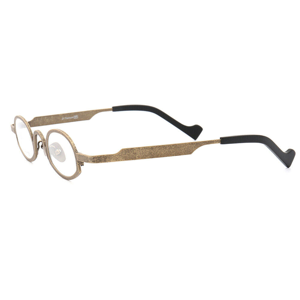 Side view of gold oval titanium eyeglasses