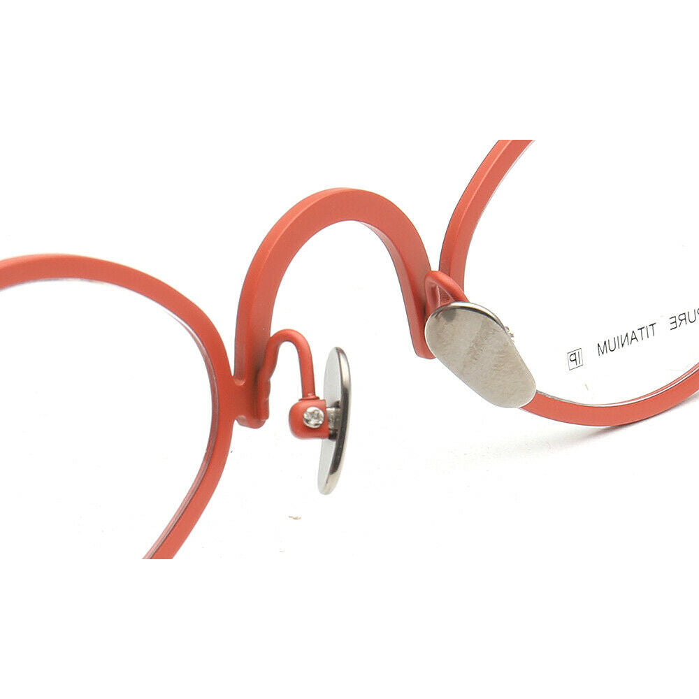 Nose pads of orange oval titanium eyeglasses