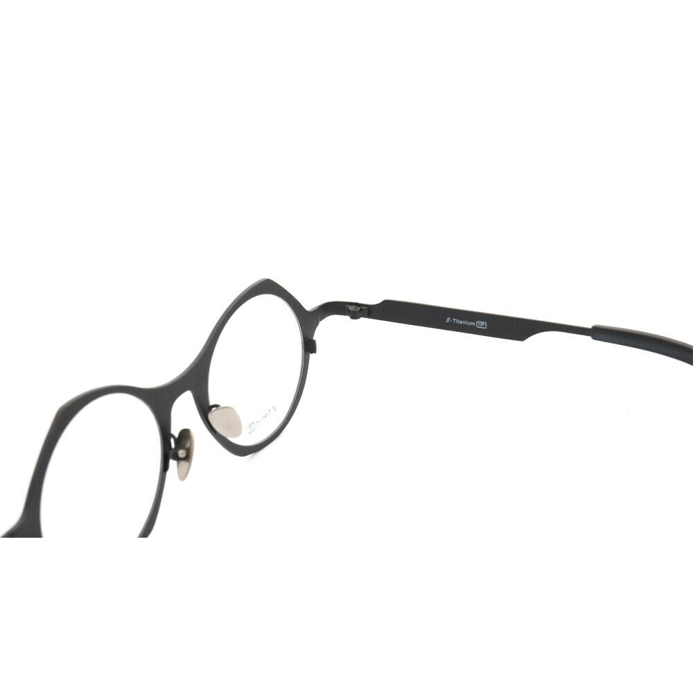 Interior of black round titanium eyeglasses